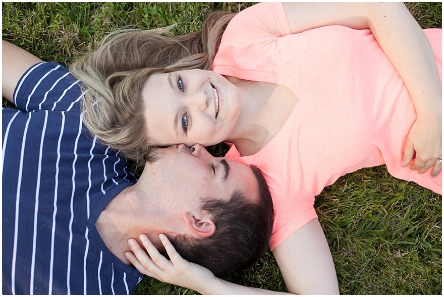 Charlotte Christ covenant church engagement photos laying in grass