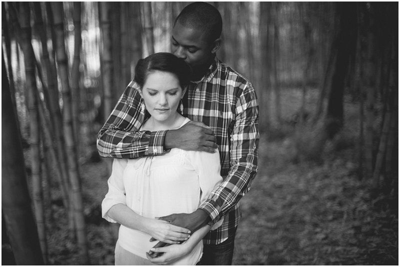 A warm embrace in the bamboo forest at the duke gardens during the duke gardens engagement session