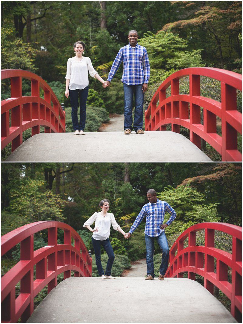 Playing around on the red bridge during the engagement session at the Duke Gardens