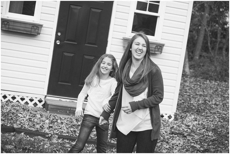 the girls playing around Charlotte north carolina fall family photography session