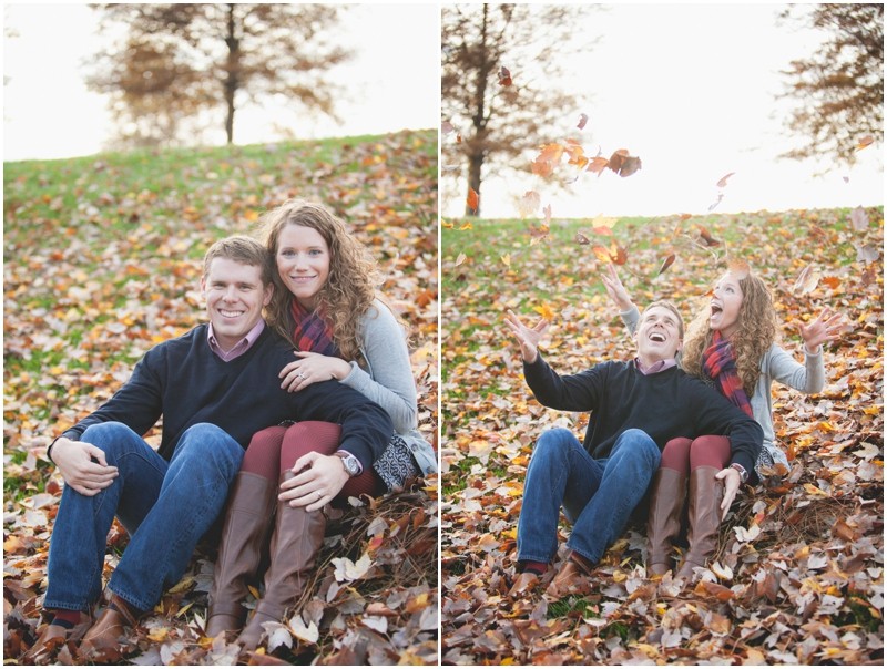 playing in the fall leaves during the  during the fall couples session in charlotte Ballantyne business park North Carolina
