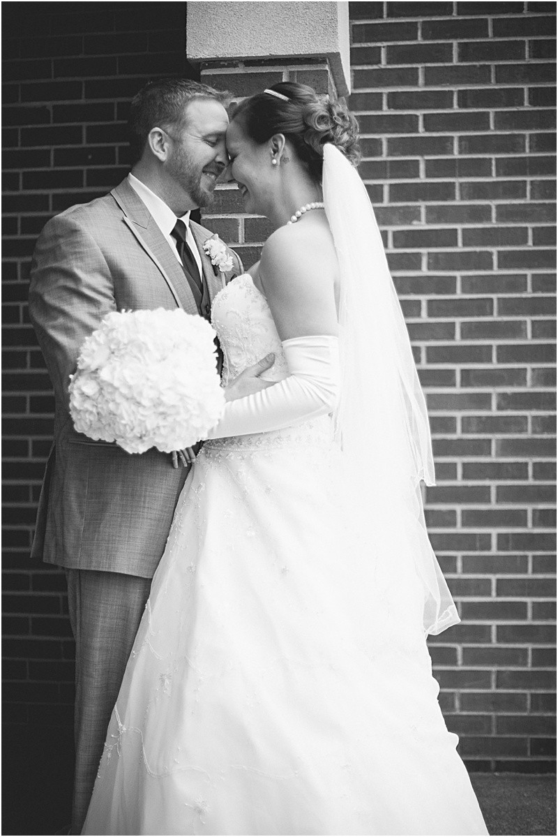 Bride and groom at their wedding day portrait session during the High Point North Carolina Wedding at First Baptist Church High Point and high point country club at Emerywood