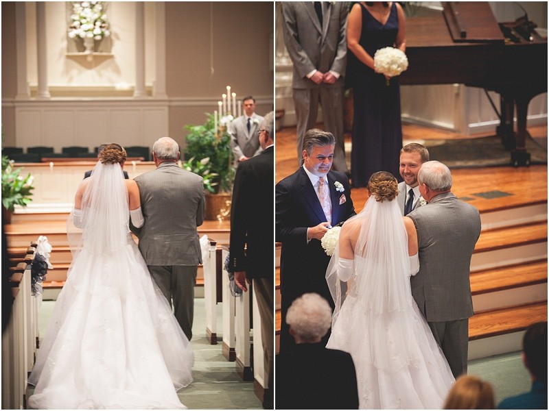 Bride walking down the aisle with her father during the sparkler exit with a fur wrap during the High Point North Carolina Wedding at First Baptist Church High Point and high point country club at Emerywood