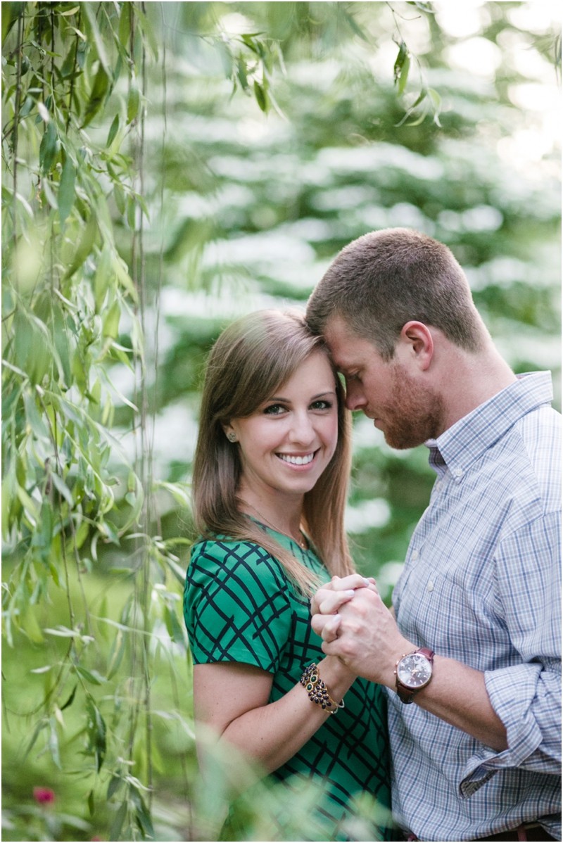 Weeping willow Andrew and Anna at the Engagement portraits at the Greensboro Bicentennial Gardens