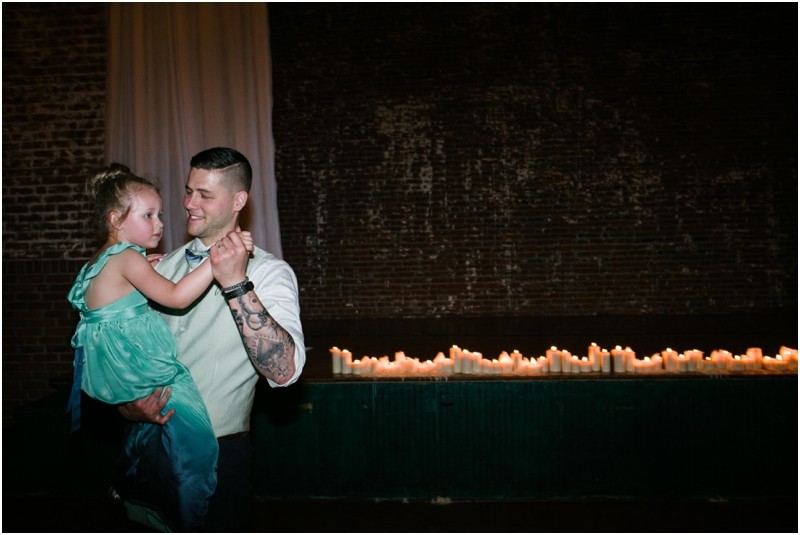 Dancing by candle light at the NC old monroe armory wedding in monroe north carolina
