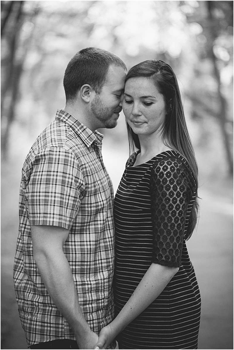 a small intimate look during the engagement session at burr mill park and the greensboro bicentennial gardens