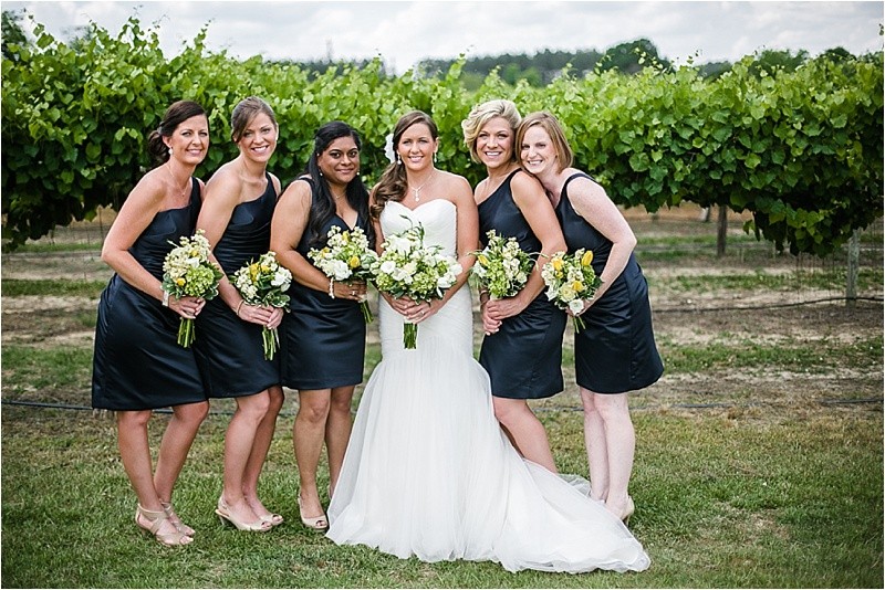 Bridesmaids during the vineyard wedding at the Hinnant Family Vineyard in Pine Level Nc near Raleigh