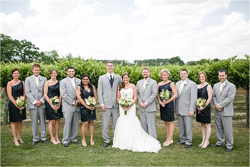 The whole bridal party during the vineyard wedding at the Hinnant Family Vineyard in Pine Level Nc near Raleigh