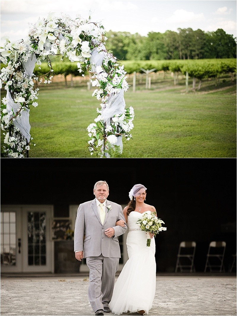Floral ceremony site and walking the bride down the aisle during the vineyard wedding at the Hinnant Family Vineyard in Pine Level Nc near Raleigh