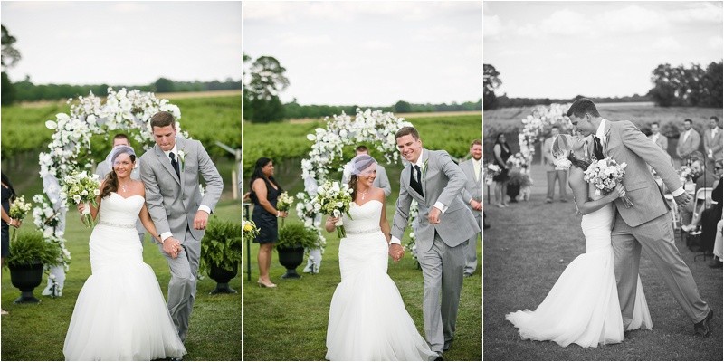 Bride and groom dancing down the aisle after the ceremony during the vineyard wedding at the Hinnant Family Vineyard in Pine Level Nc near Raleigh