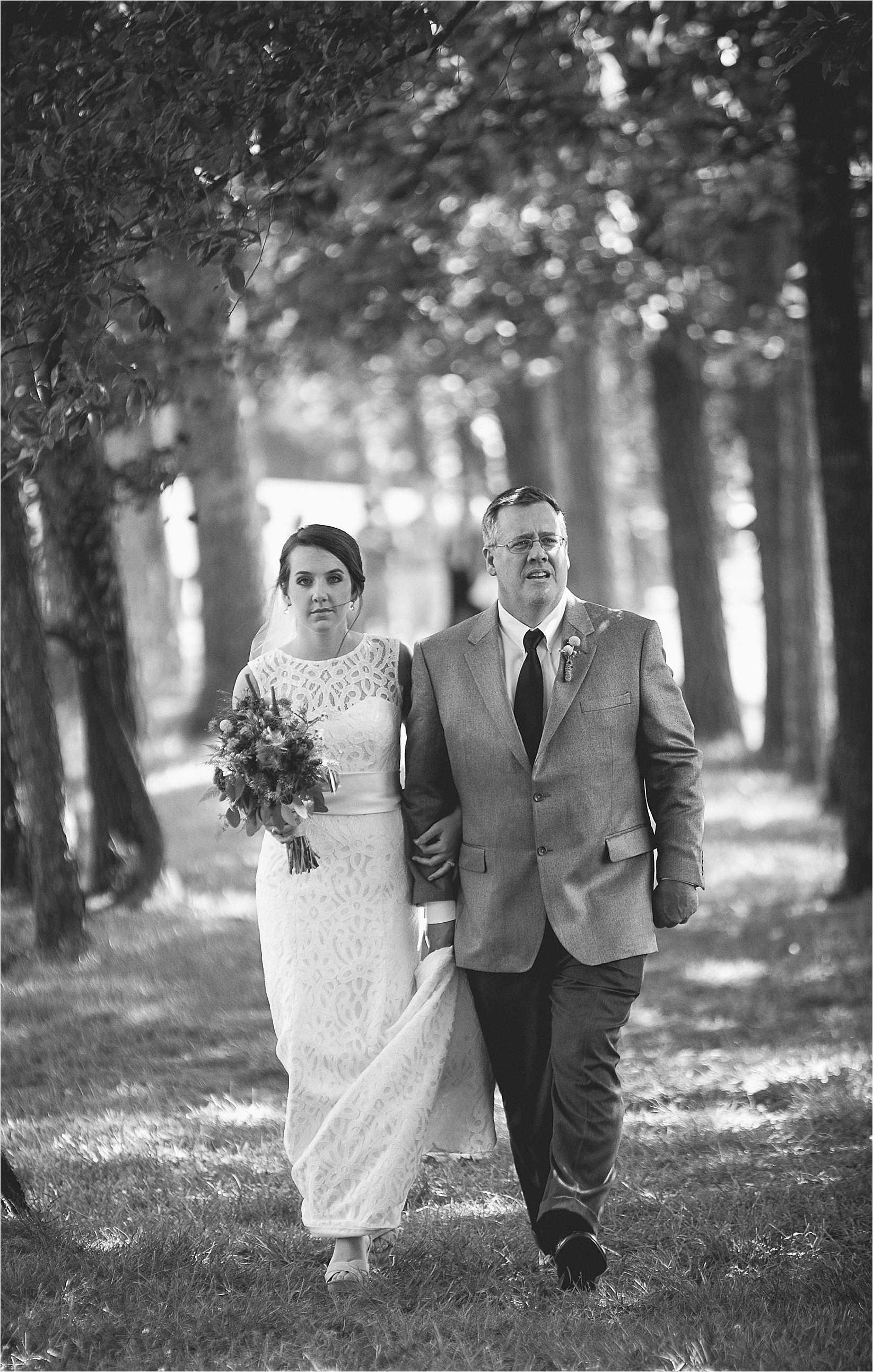 Bride and father walking to the ceremony at Caroline and Evans mountain wedding at yesterday spaces in asheville leicester north caroline
