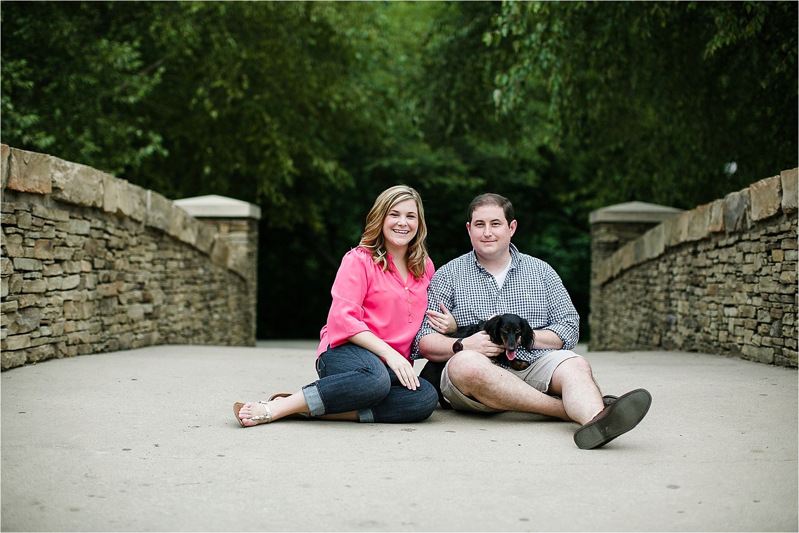 On the bridge at Catherine & Jordan's engagement session at freedom park and marshall park in Charlotte North Carolina