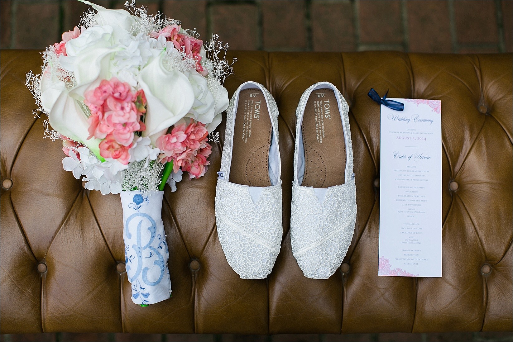 Flowers toms shoes and wedding papers at the davidson college chapel wedding in Davidson north Carolina and the Charles mack citizen center wedding and reception