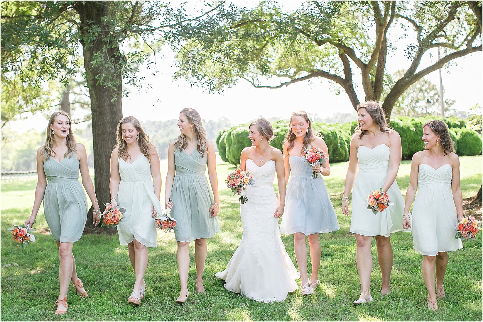 bridesmaids walking and talking during their wedding at the Historic Rural Hill wedding ceremony and reception in Huntersville nc