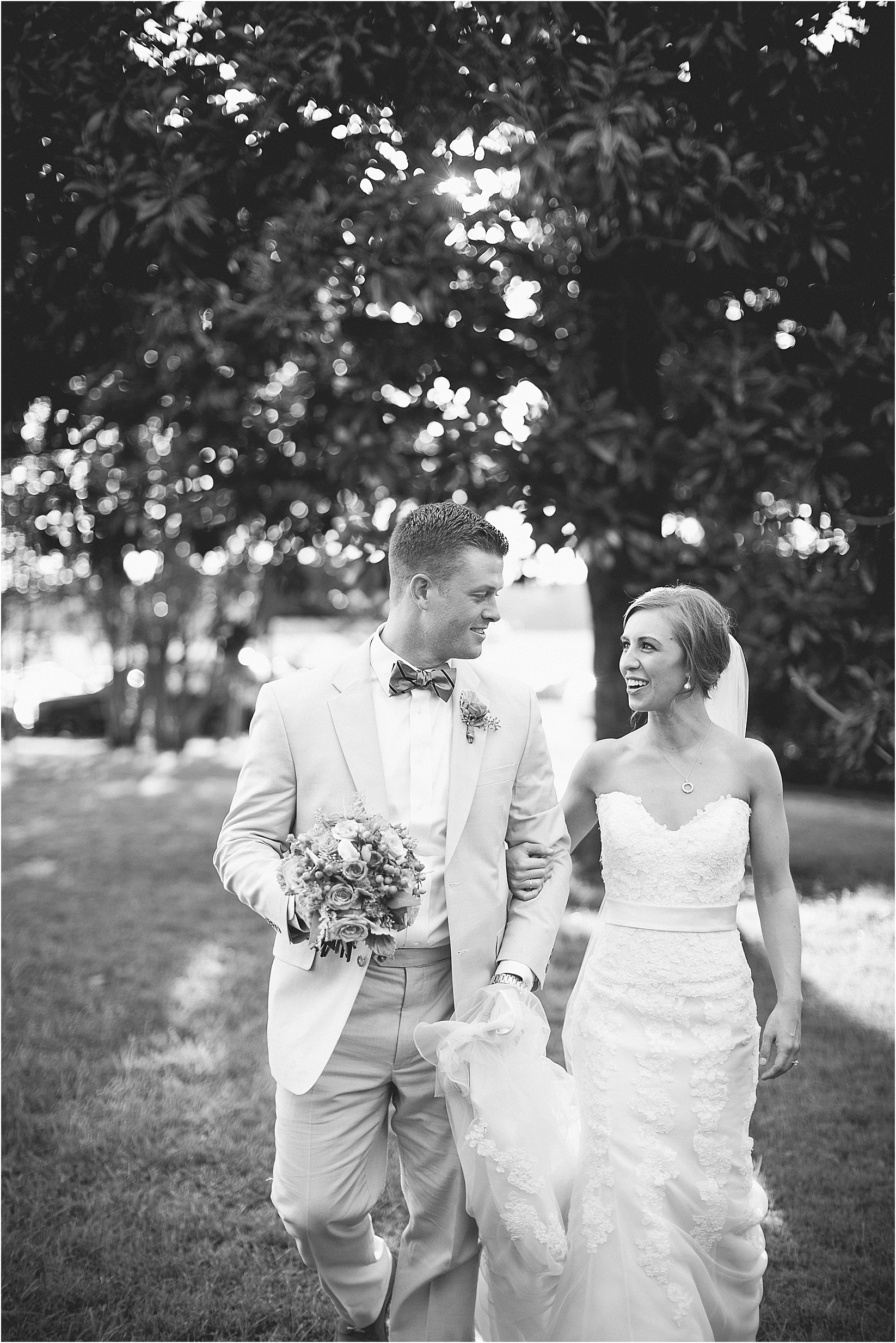 taking a walk during their wedding at the Historic Rural Hill wedding ceremony and reception in Huntersville nc