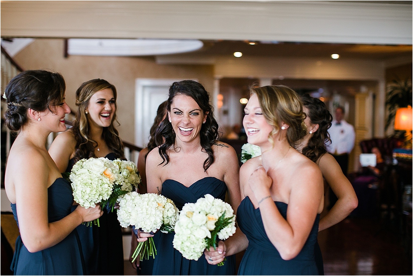 bridesmaids during the Charlotte City Club wedding in charlotte North Carolina