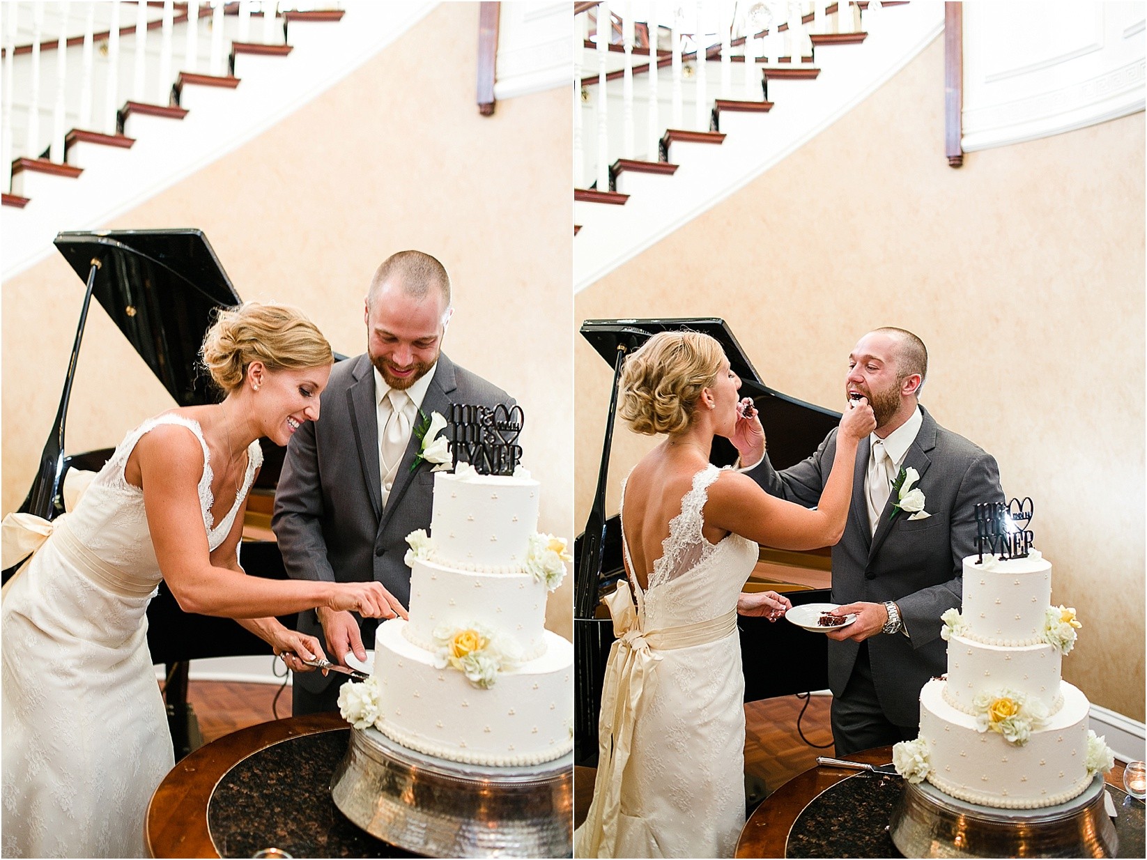 Cake cutting at the Charlotte City Club wedding in charlotte North Carolina