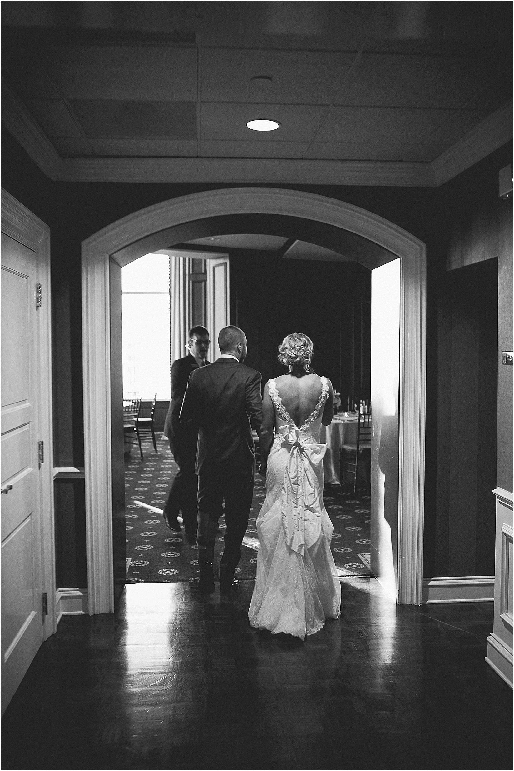 Walking into the reception at the Charlotte City Club wedding in charlotte North Carolina