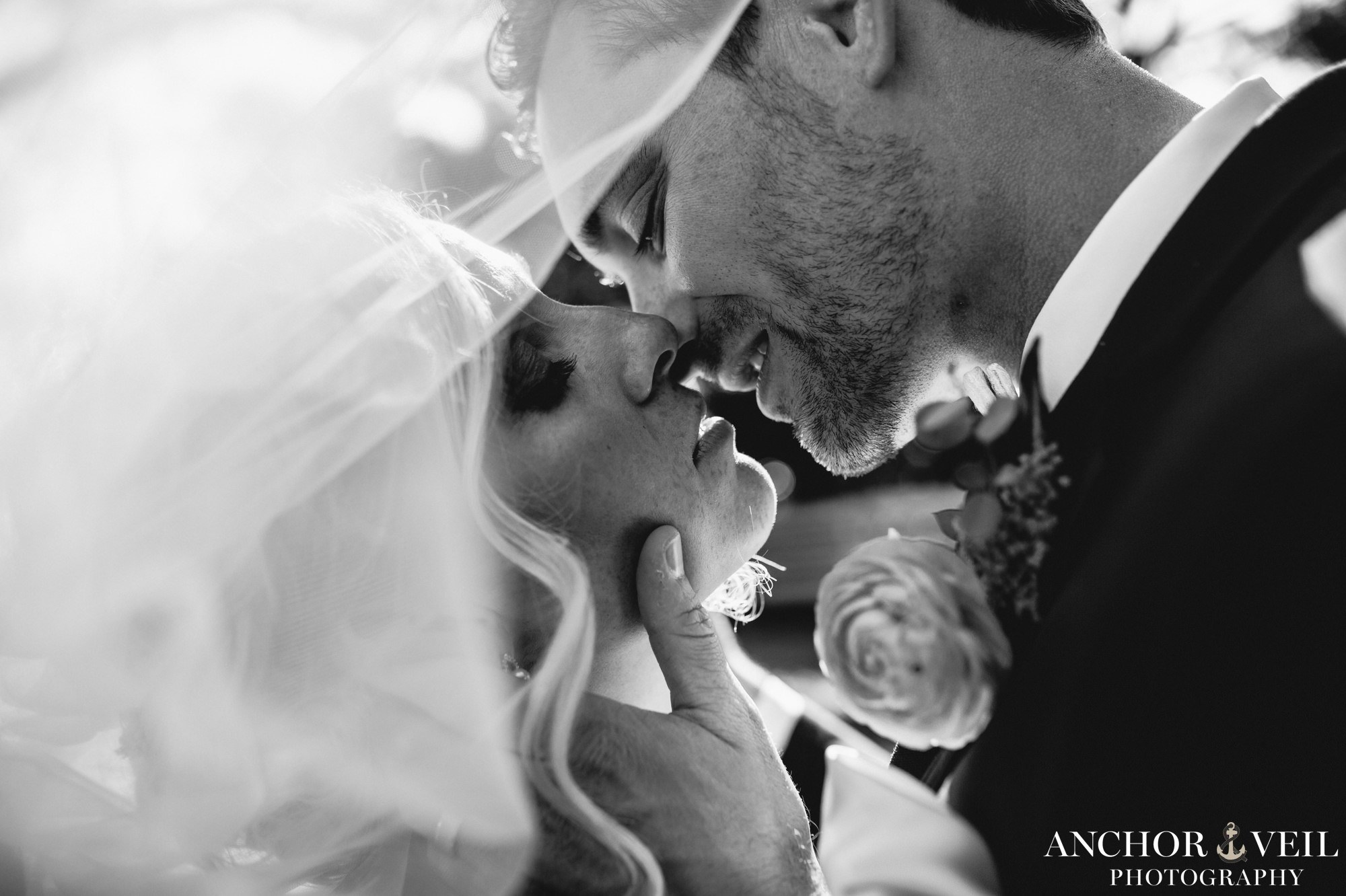 black and white almost kiss by bride and groom