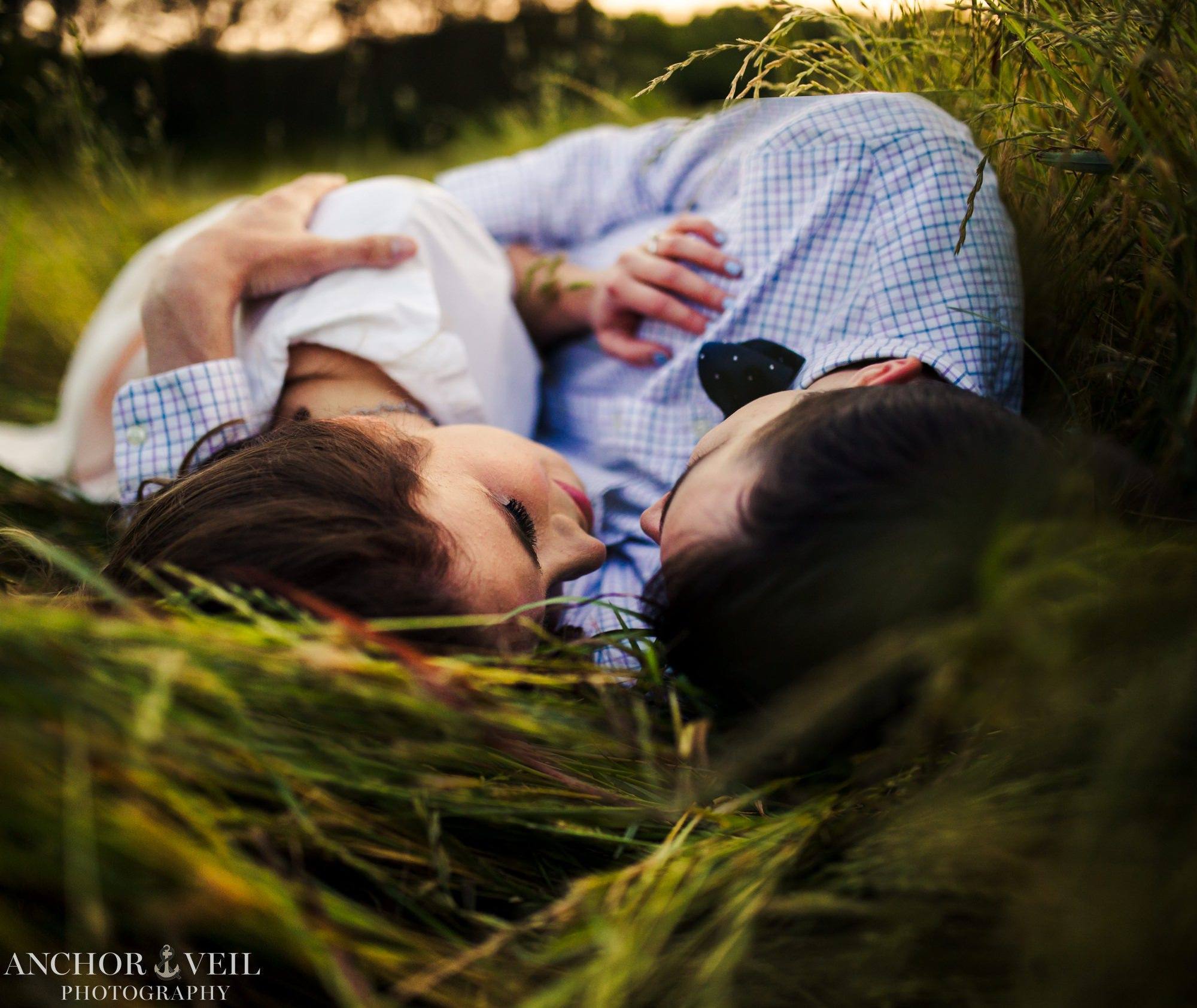 laying together in the grass