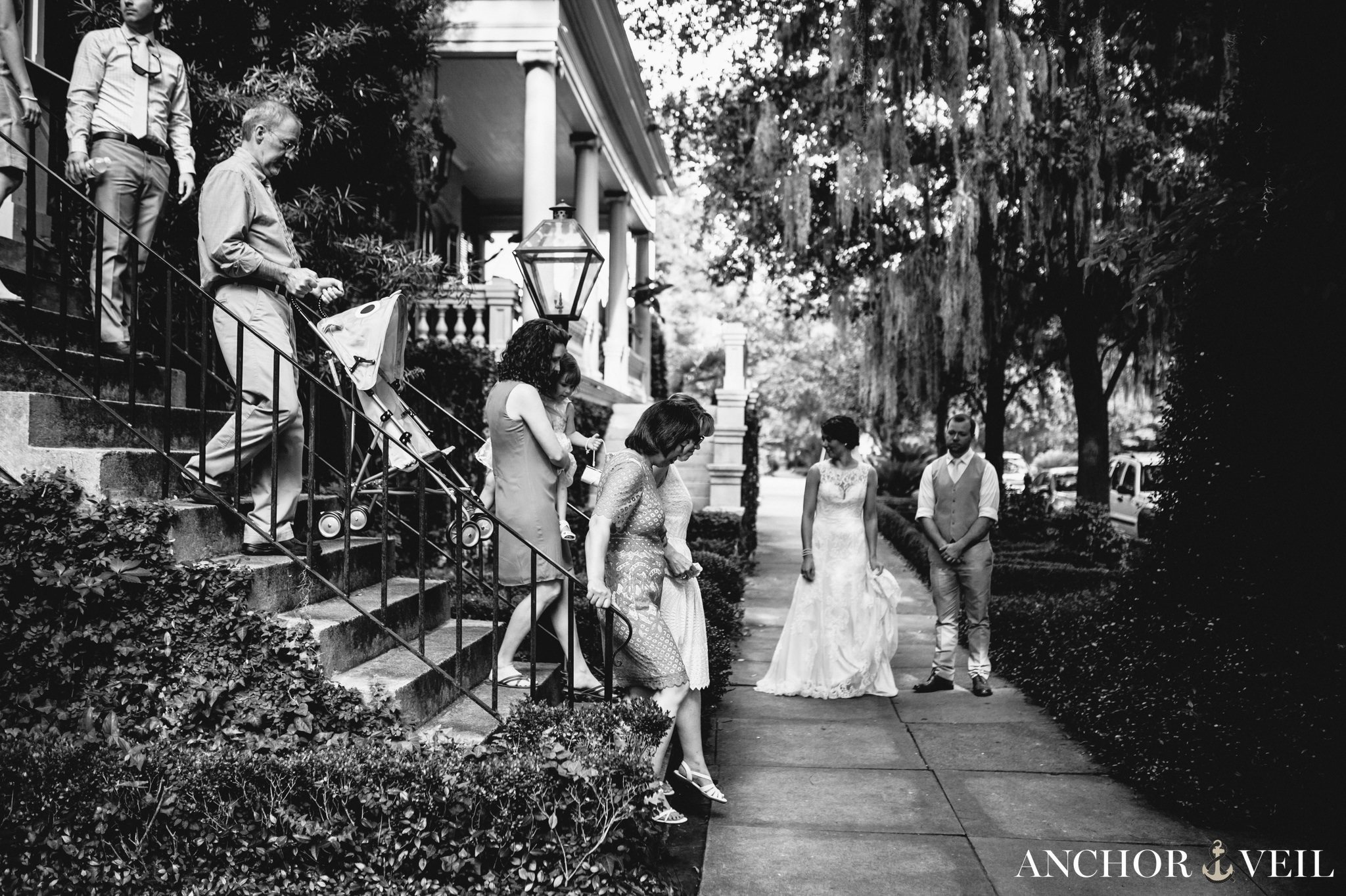 everyone walking to the ceremony during their Forsyth Park Wedding Elopement