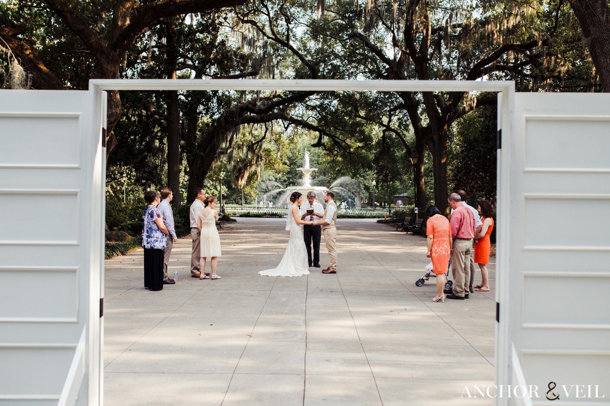 the view of the whole ceremony at the park during their Forsyth Park Wedding Elopement