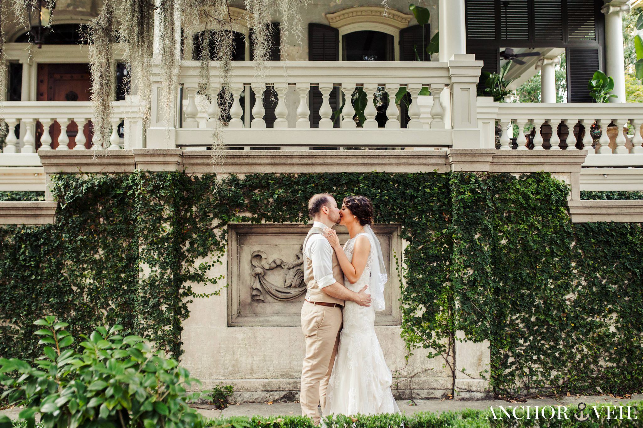 symmetry with the beautiful house during their Forsyth Park Wedding Elopement
