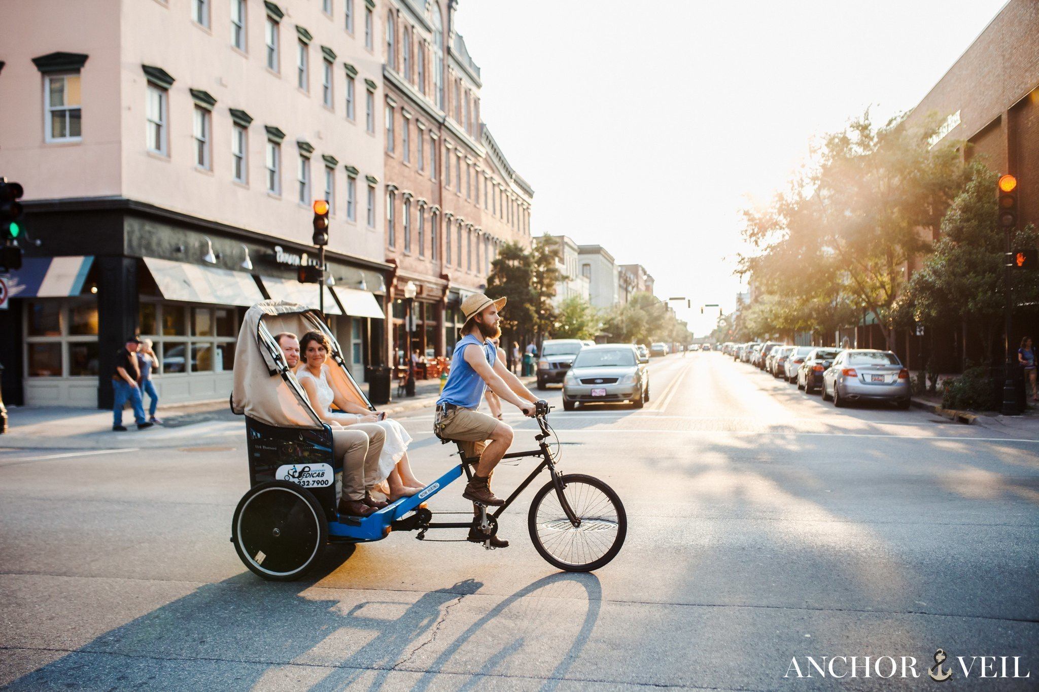 riding the pedicab through the city during their Forsyth Park Wedding Elopement