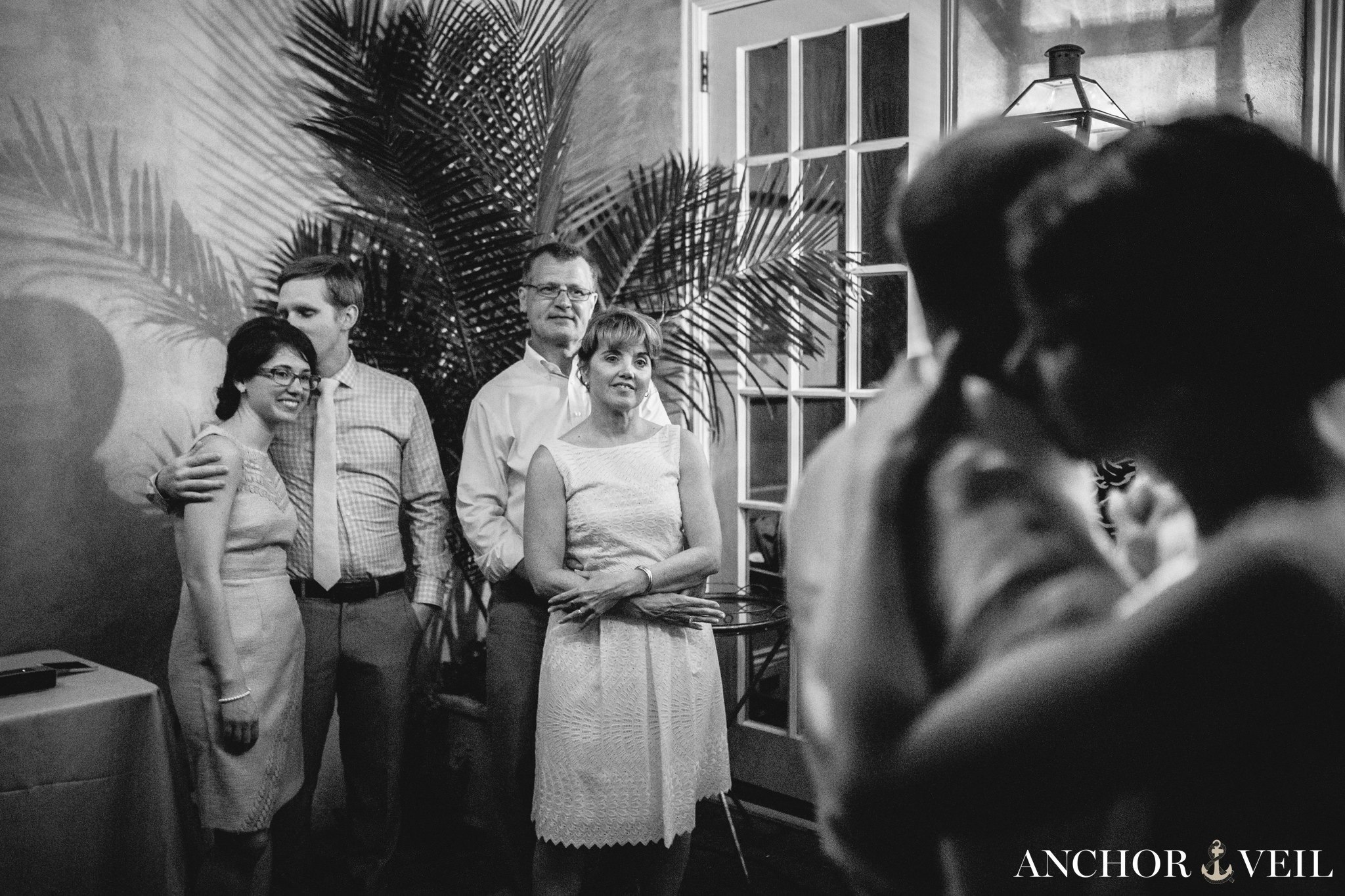 first dance with everyone in the background during their Forsyth Park Wedding Elopement