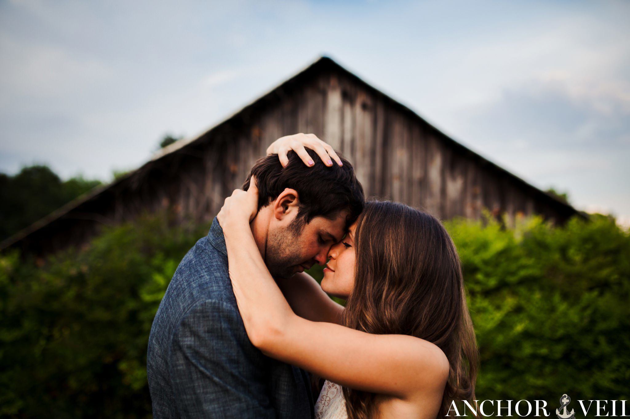 the barn with angles looks awesome as she holds him
