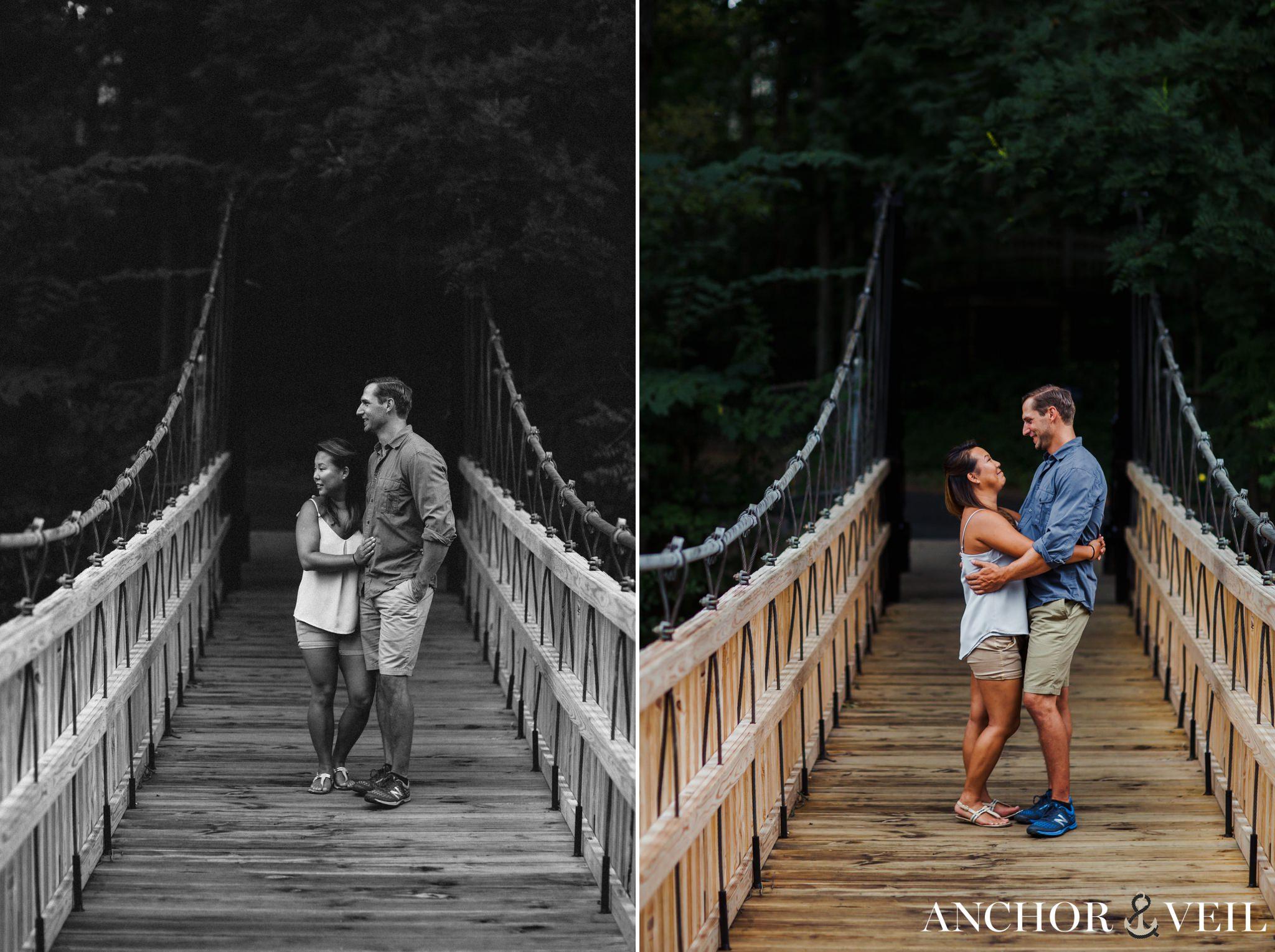 standing on the wooden bridge during their Freedom Park Engagement Session