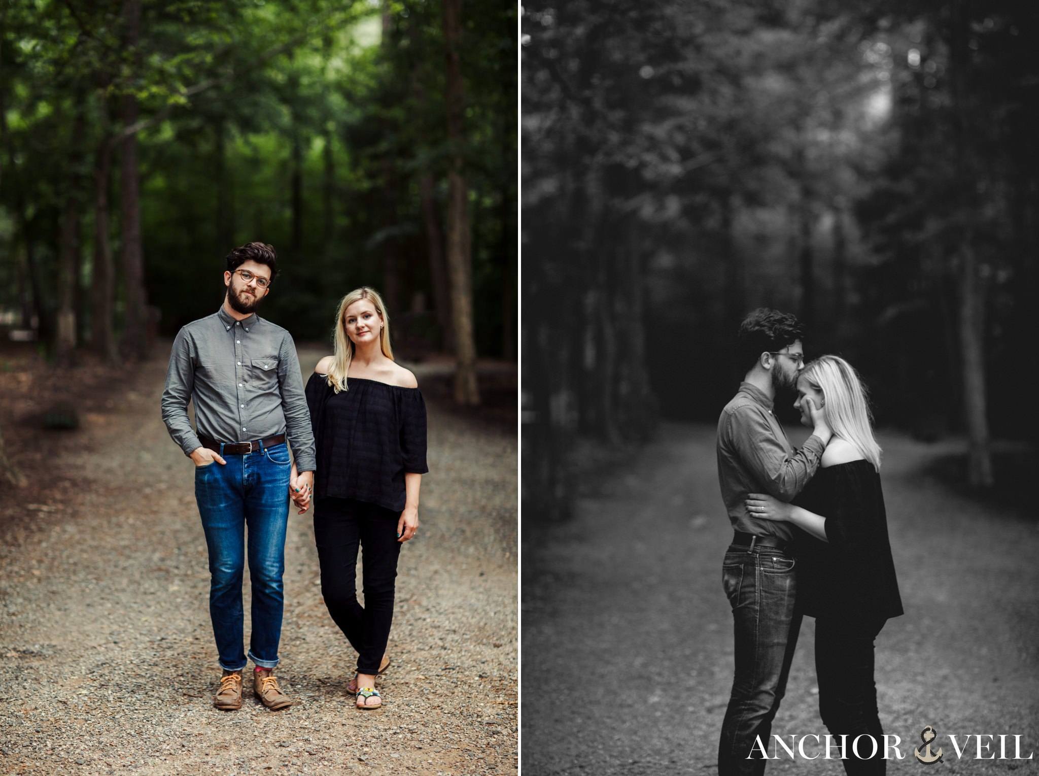 standing in the woods and kissing her forehead during their McDowell Nature Preserve Engagement Session
