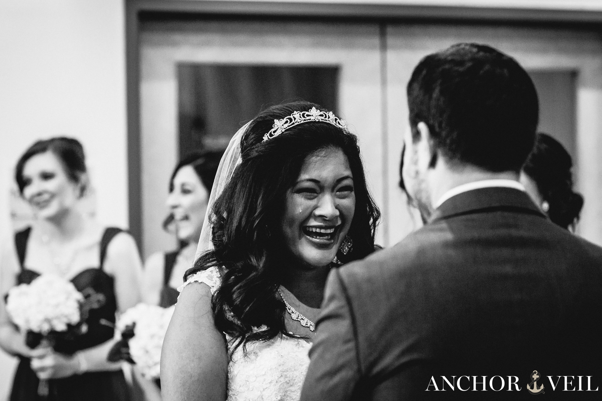 bride crying while exchanging vows