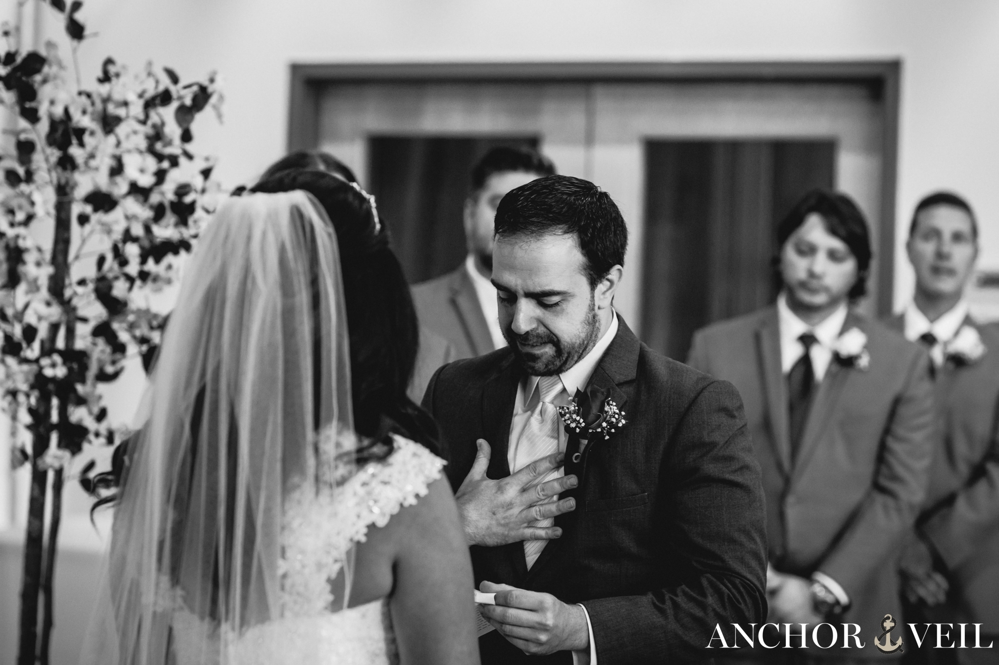 groom crying while exchanging vows