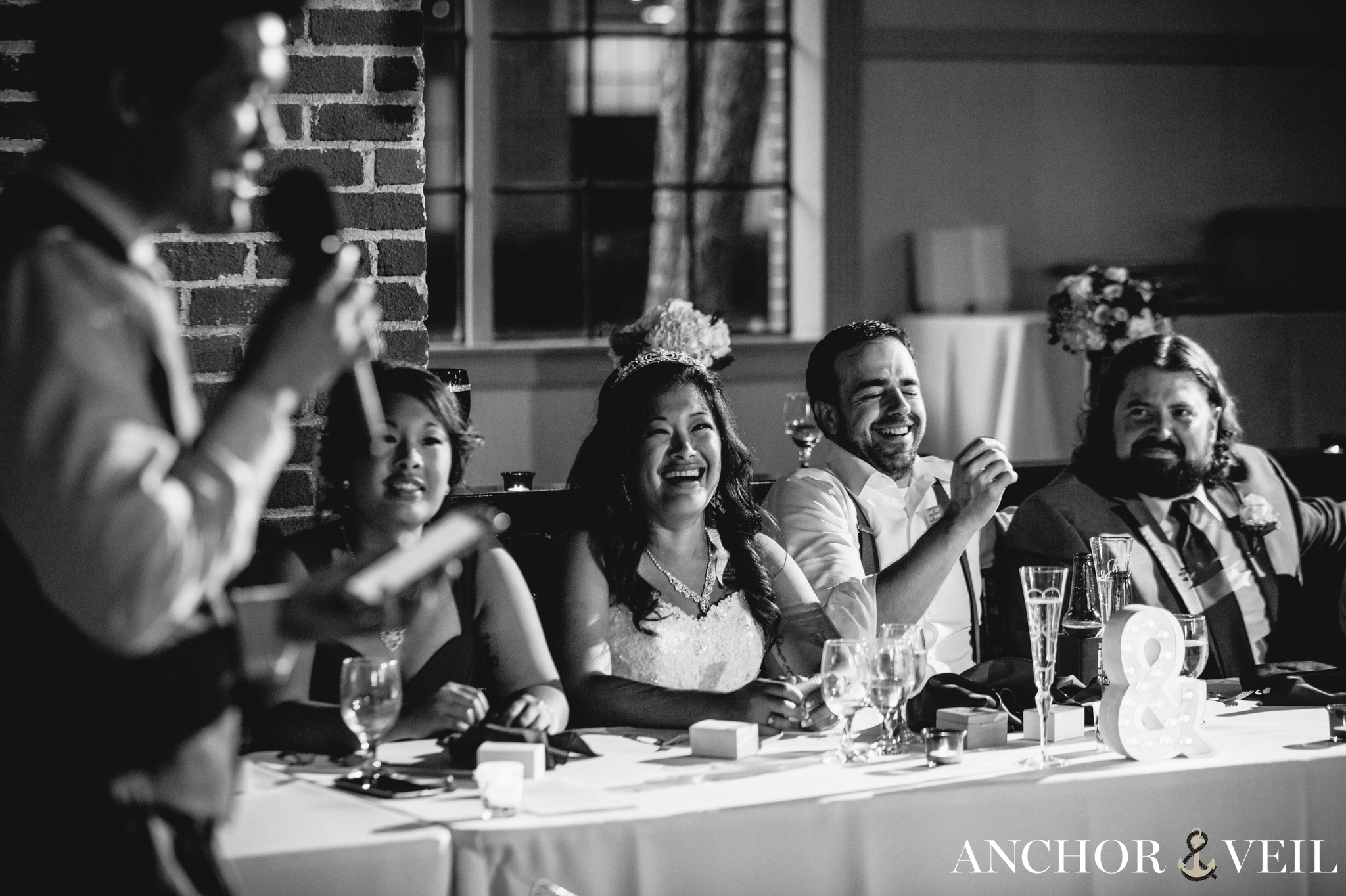 laughing and crying during her brothers toast