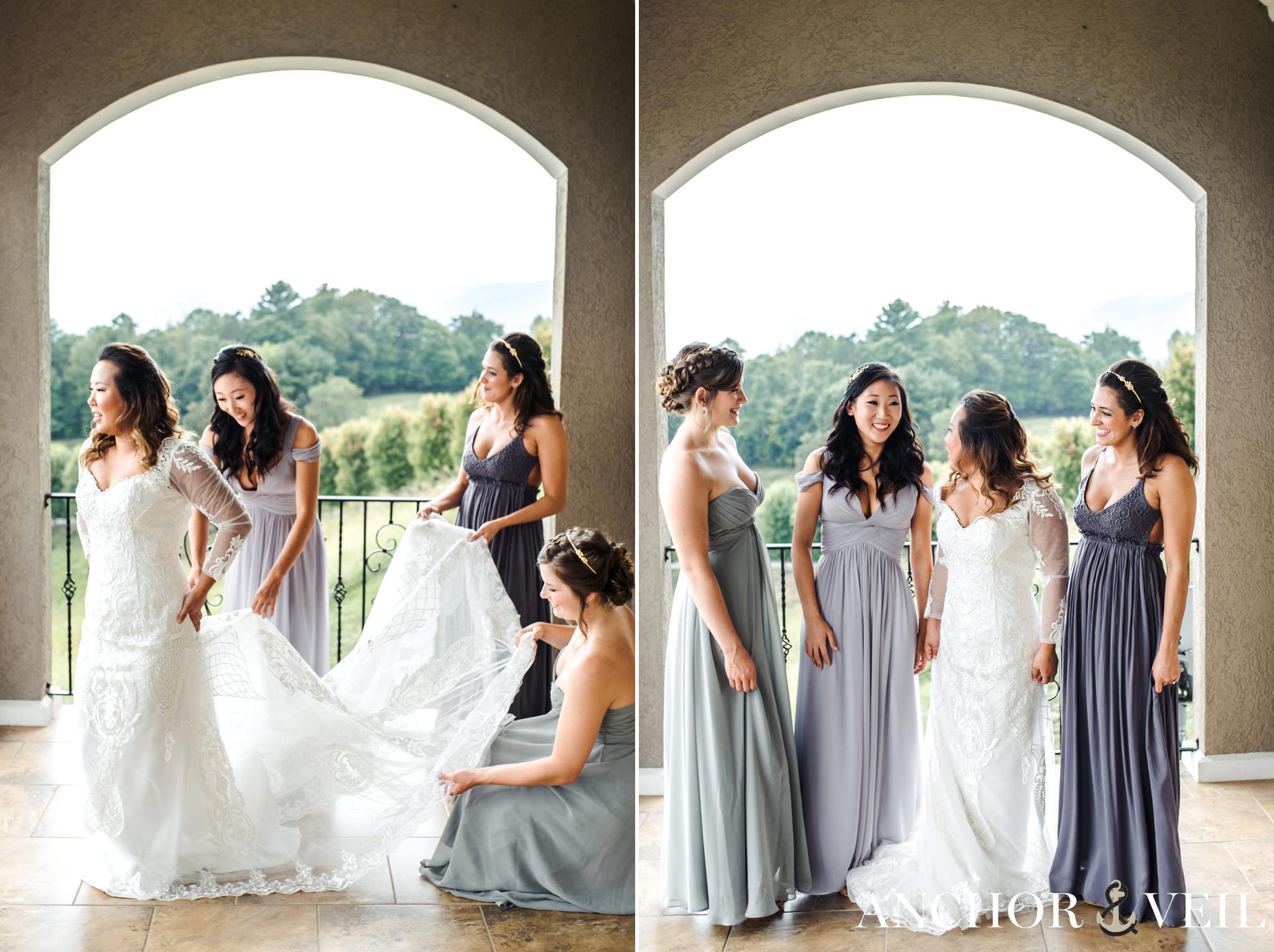 bridesmaids helping to get the dress on during the asheville mountains destination wedding
