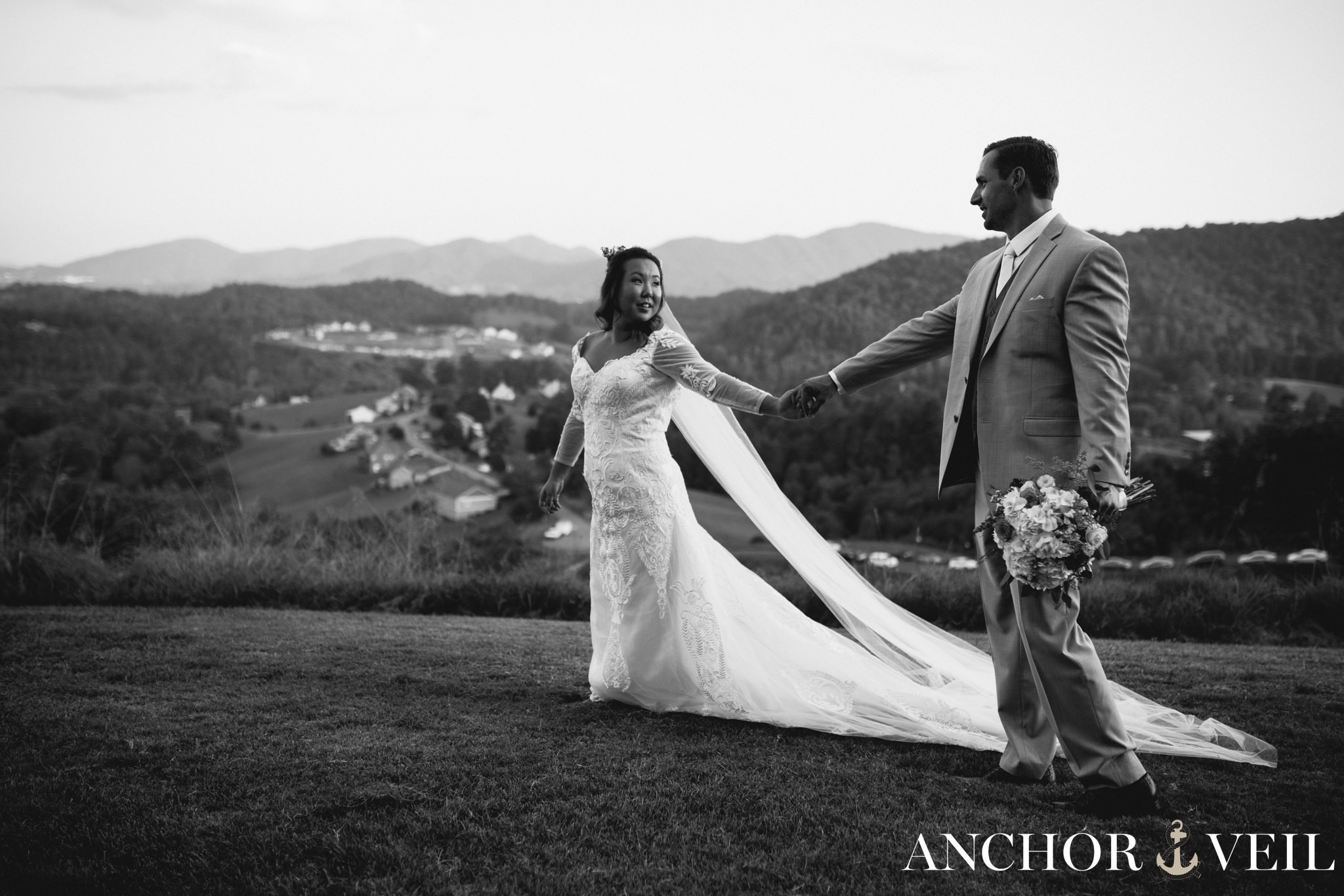 black and white bride and groom overlooking asheville mountains destination wedding