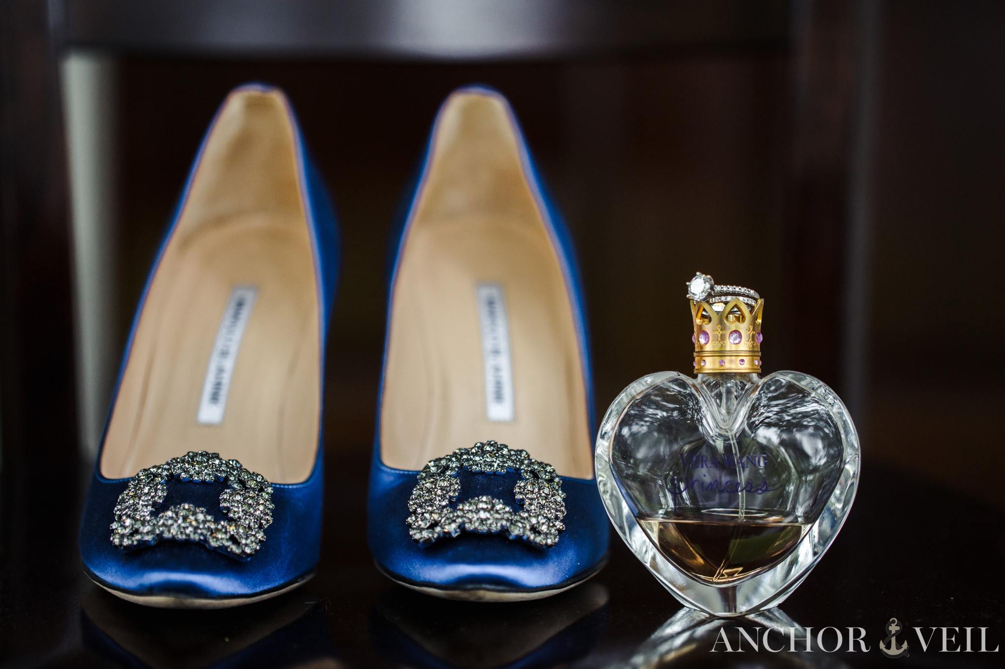 bride shoes with ring and perfume