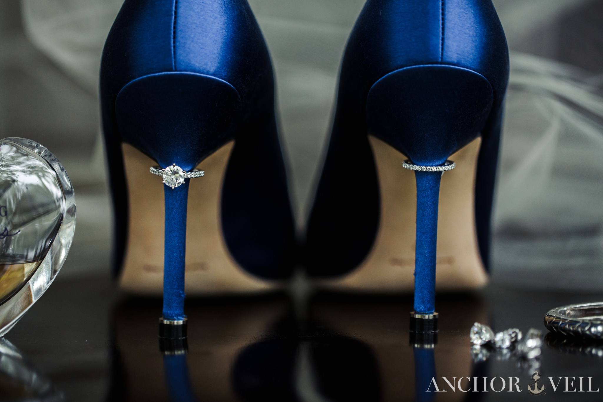 bride with her ring and shoes