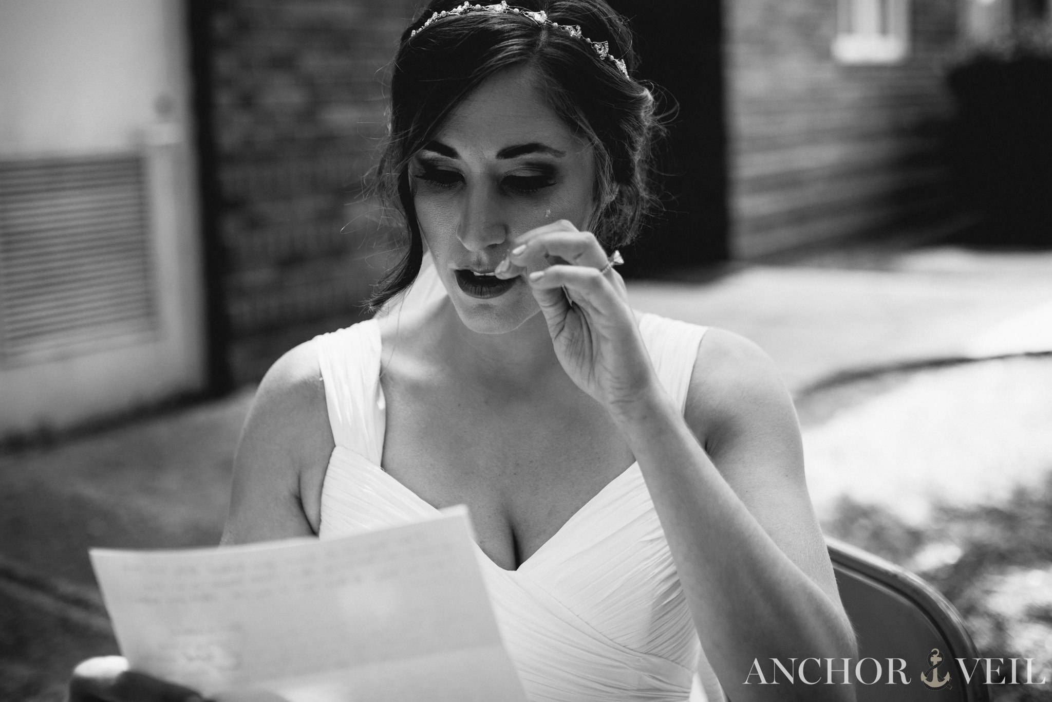 bride crying reading the letter