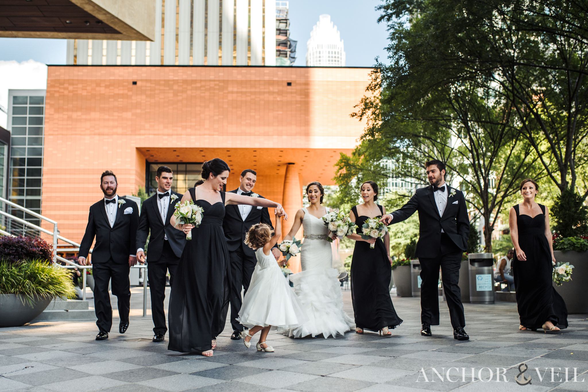 bride and groom outside of the mint museum in uptown charlotte wedding