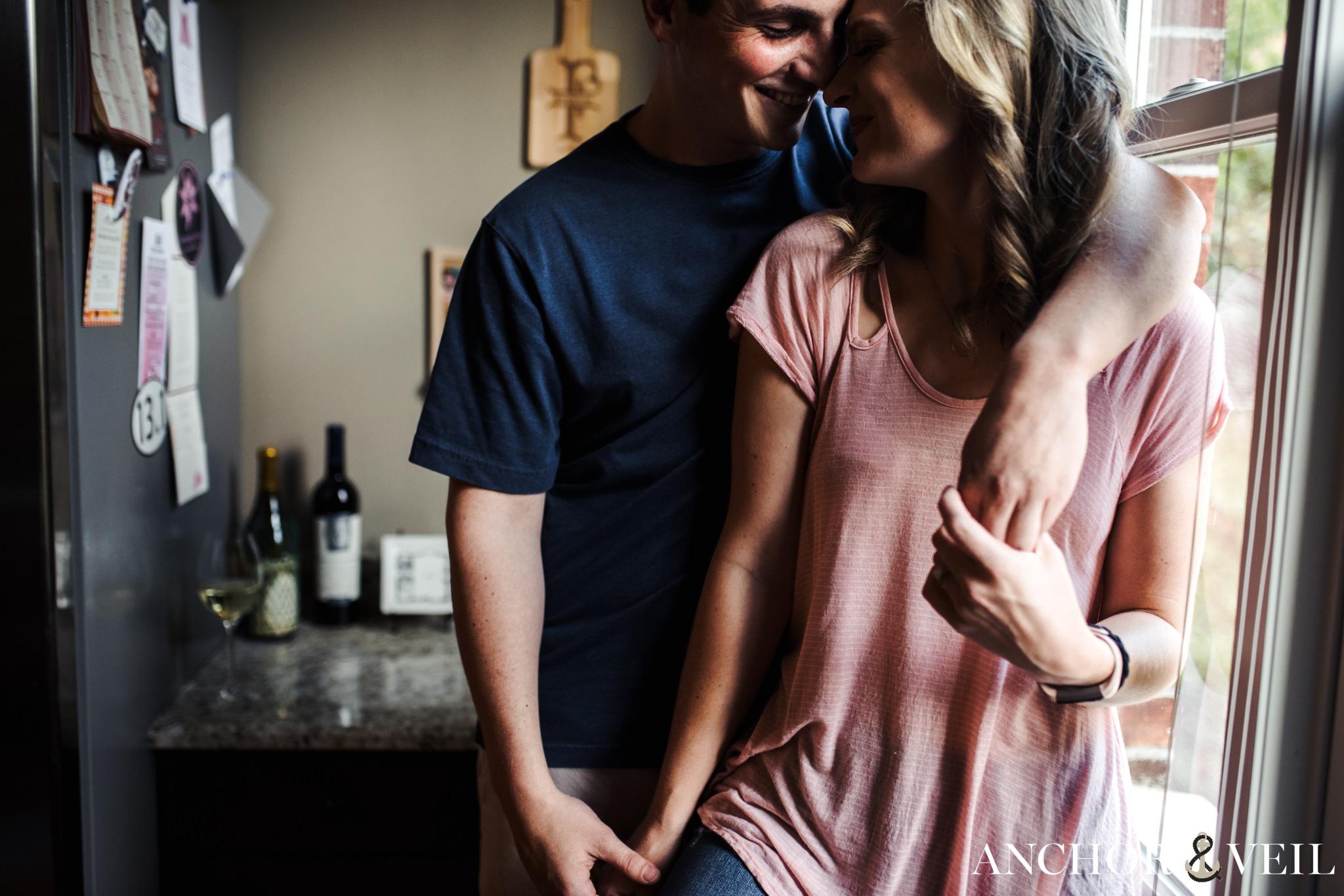 nose to nose during the in In Home Charlotte Engagement Session
