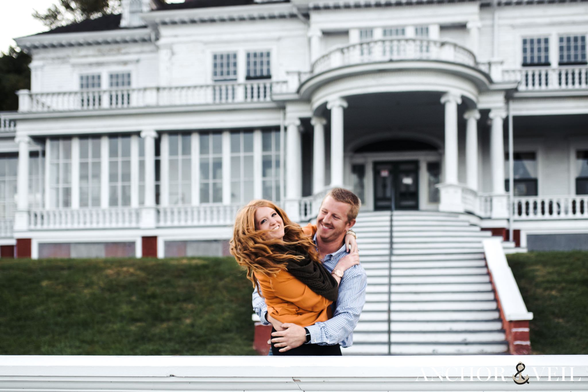 A sweet smile while these lovers embrace at the Moses Cove Manor in Boone for their engagement session