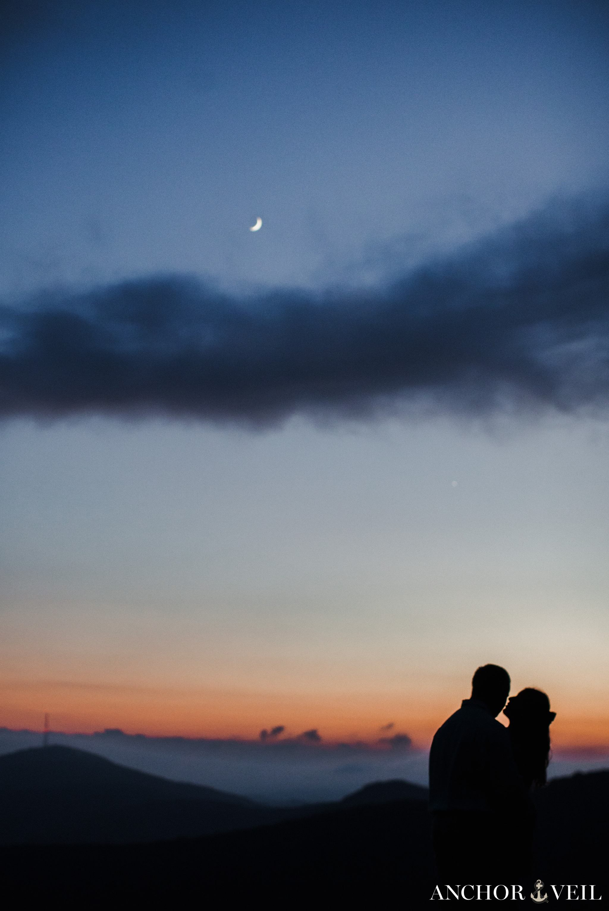 the moon and sunset silhouette during the Boone Blue Ridge Parkway Engagement Session