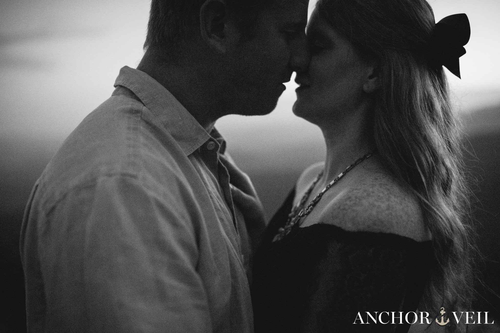 black and white grainy love on rough ridge during the Boone Blue Ridge Parkway Engagement Session