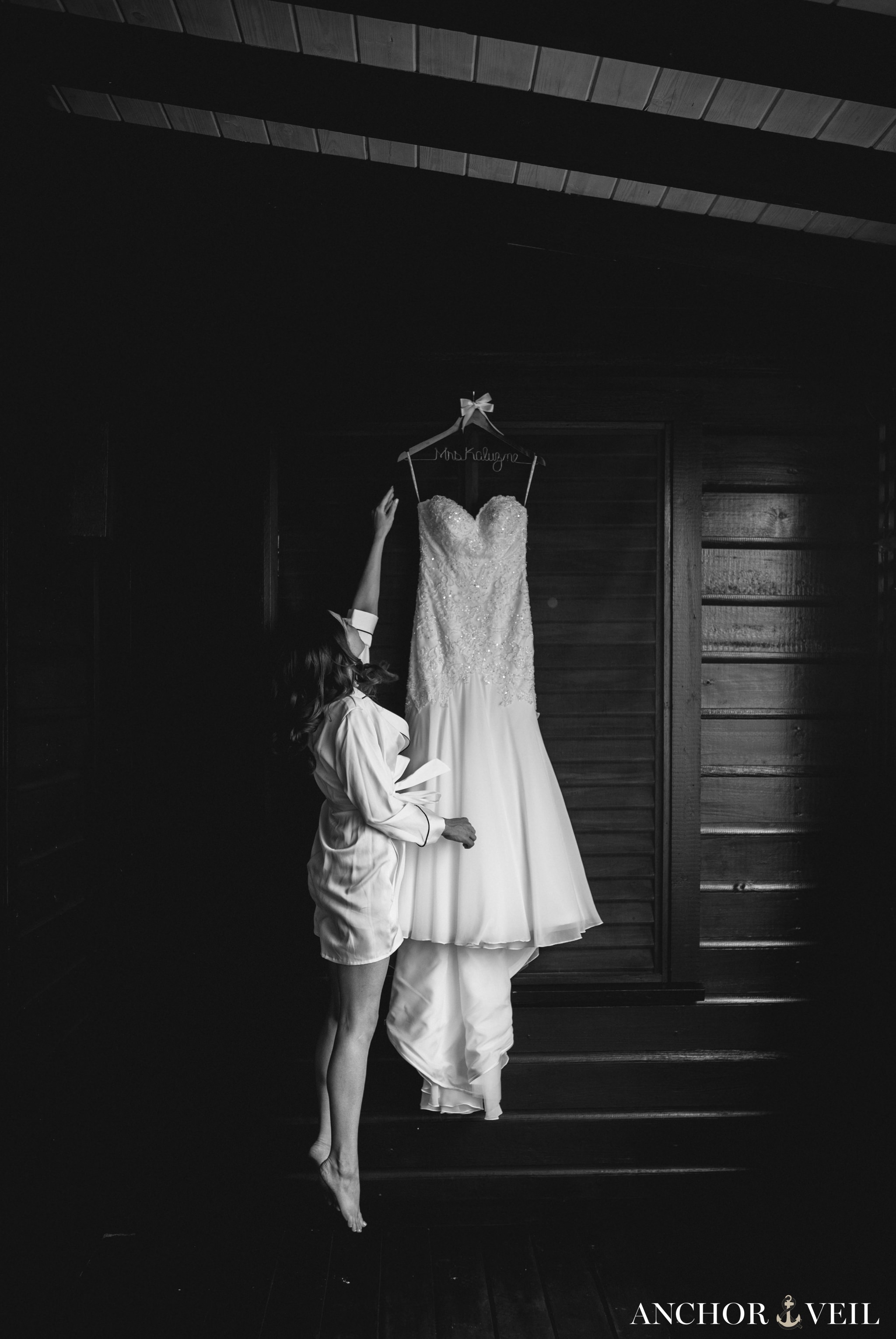 bride jumping to get her dress 