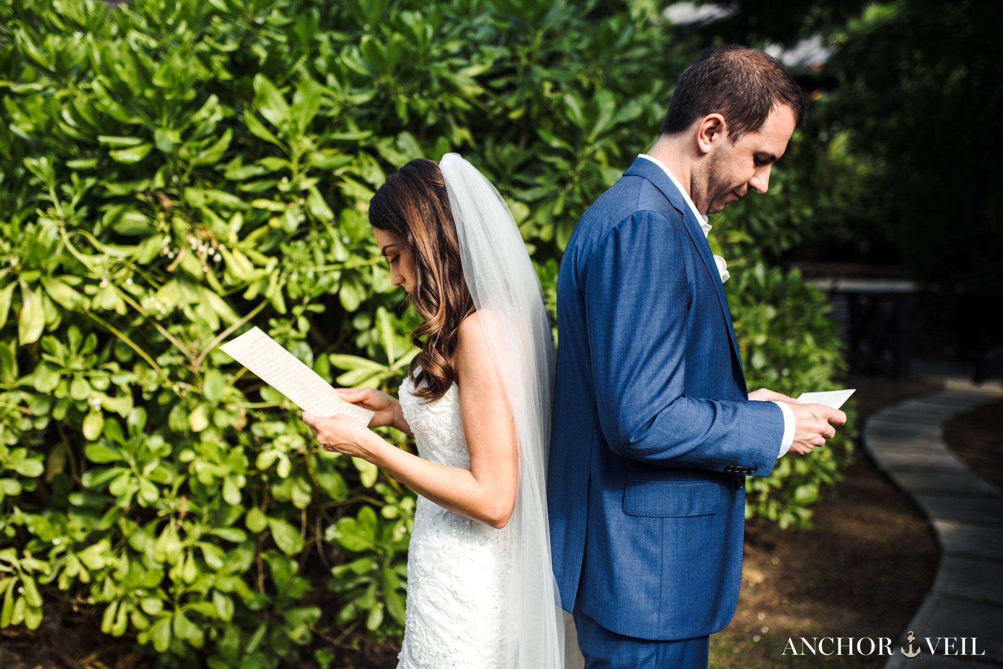 bride and groom reading notes