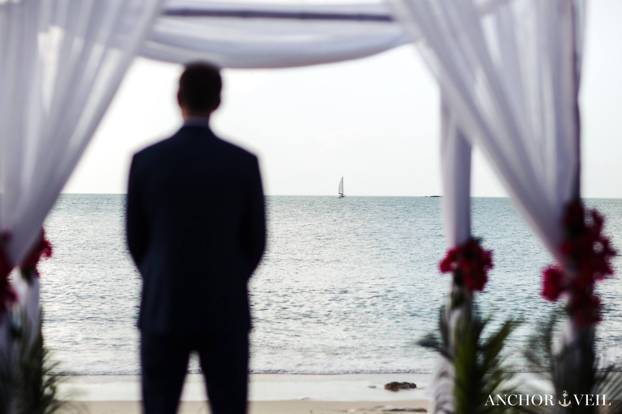 groom waiting for the bride to get to her at the Hermitage Bay Antigua Wedding