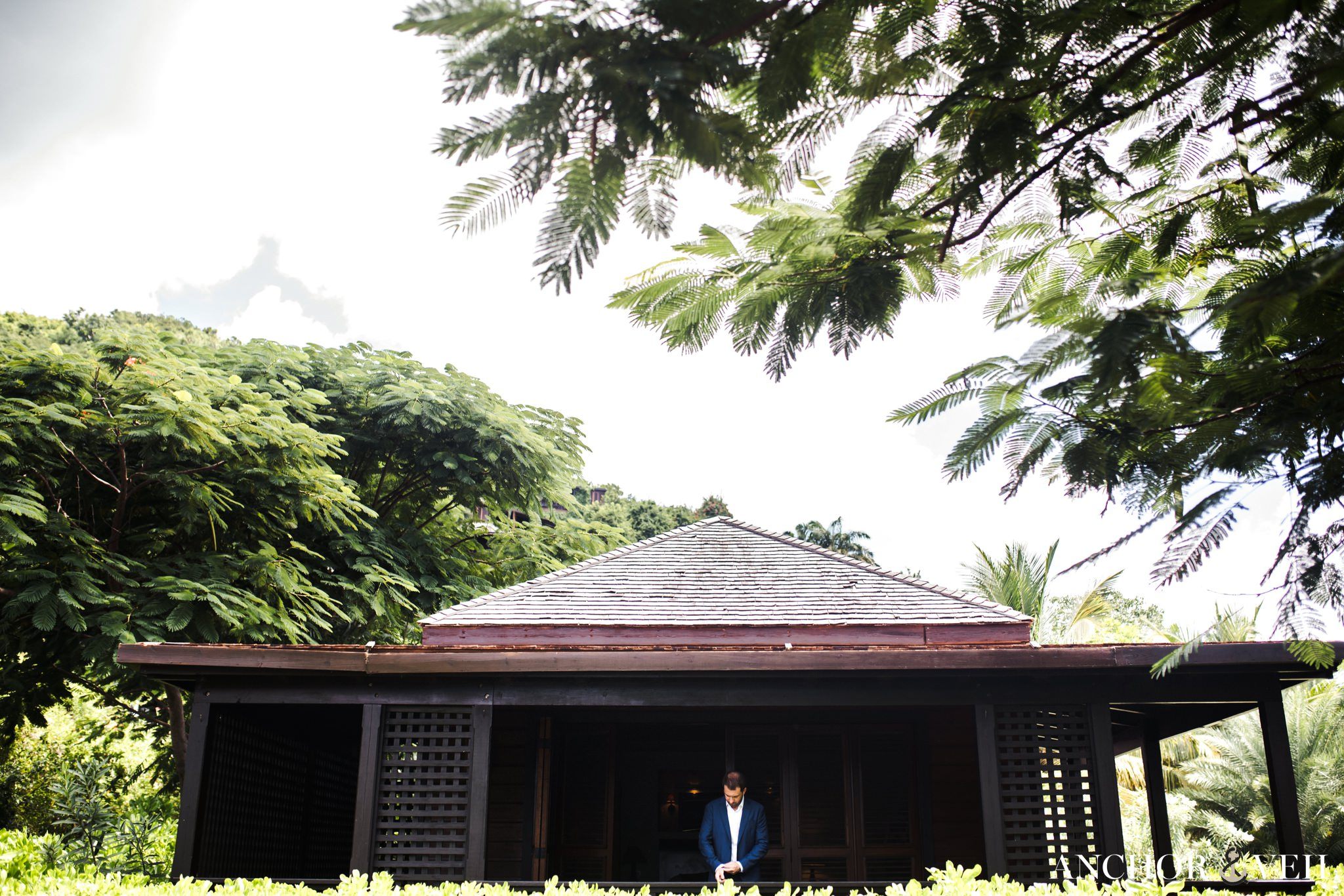 groom with one of the bungalows during the v