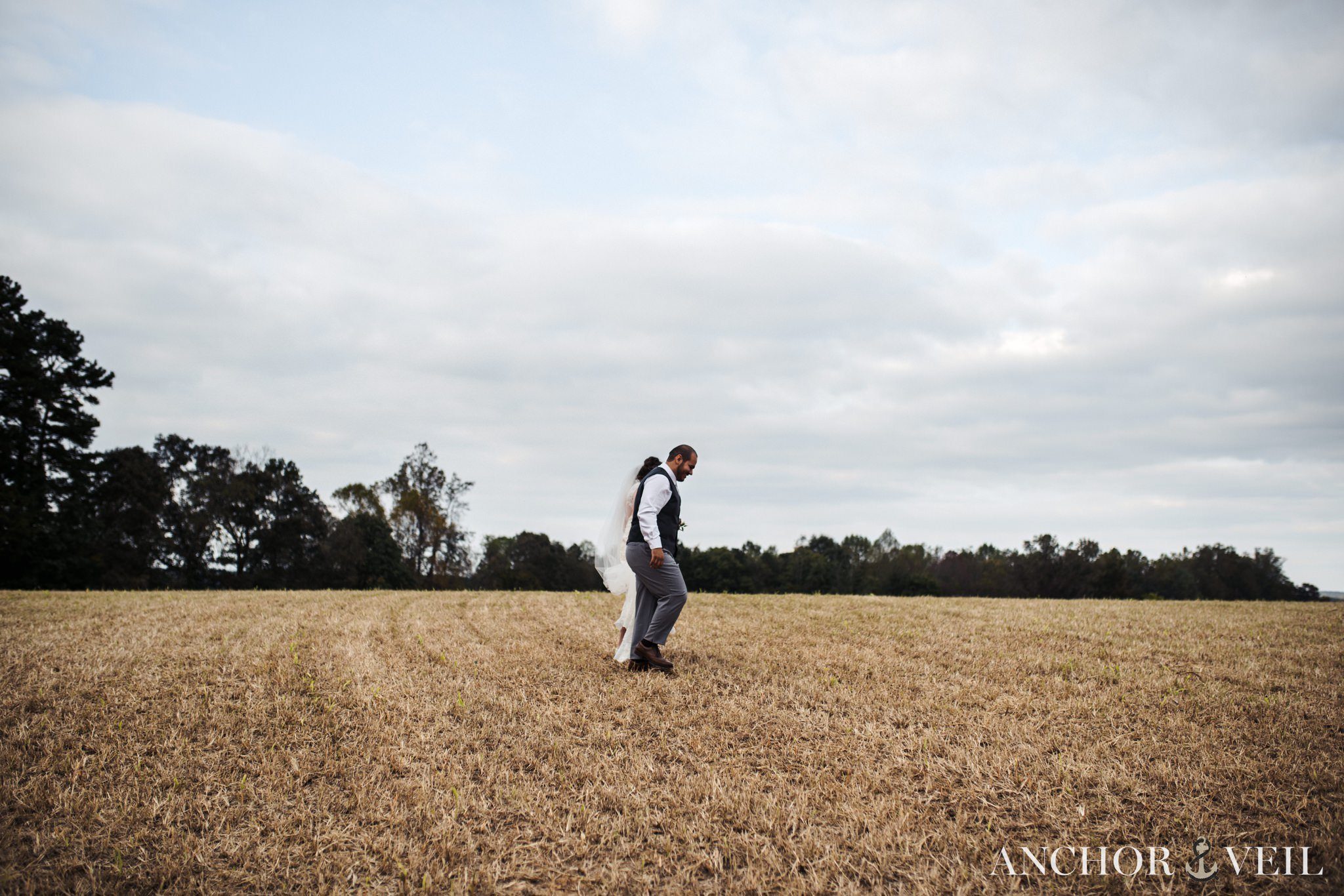 walking on the fields during the Hunting Creek Farms Wedding